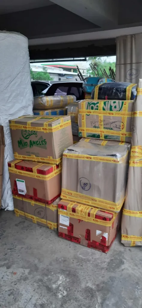 Packed household cartons ready for loading on moving day by packers and movers in Kakinada